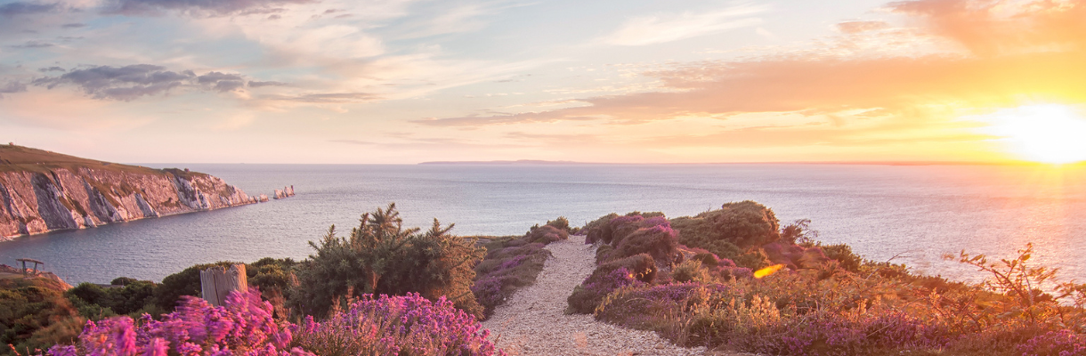 Sun setting over the needles from Headon Warren on the Isle of Wight