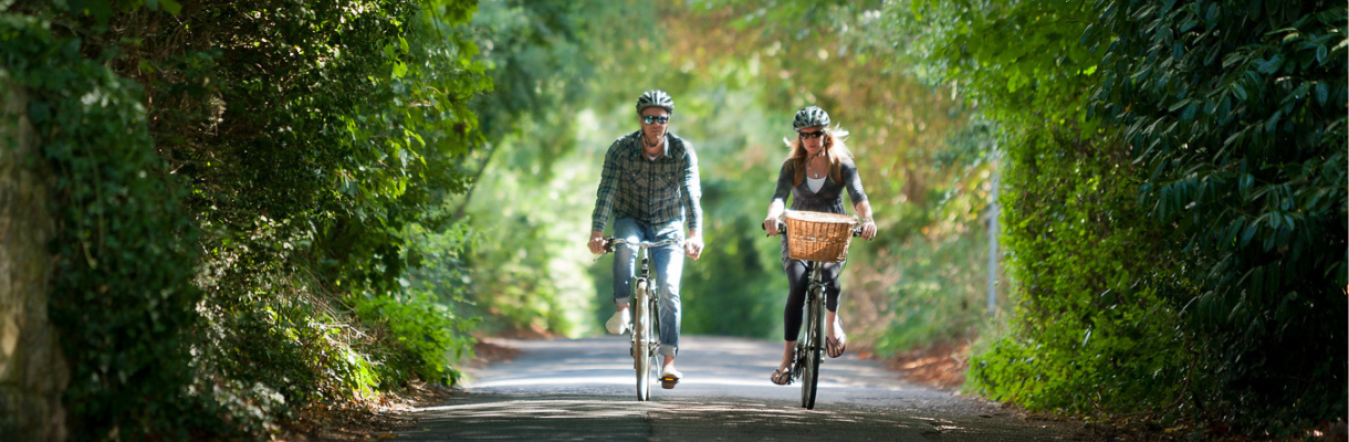 Couple cycling through the Isle of Wight