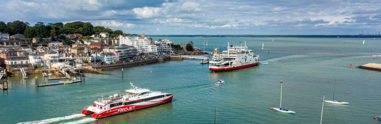 Red Funnel's Red Jet and vehicle ferry sailing out of Cowes on the Isle of Wight