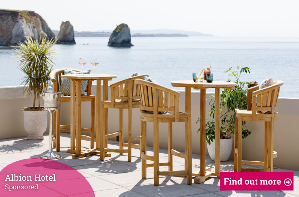 Table & chairs on the terrace with a sea view at The Albion Hotel, Isle of Wight