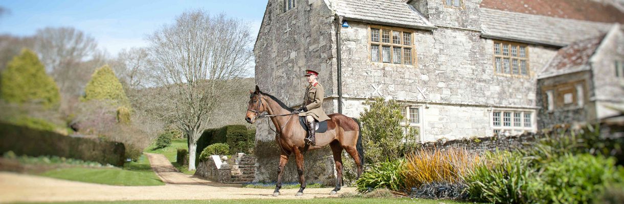 Rider on horse at Mottistone Gardens on the Isle of Wight